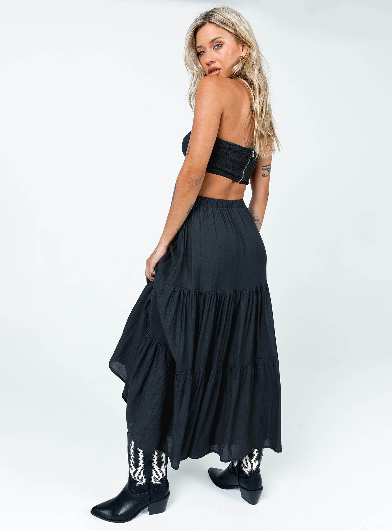 Black matching set Crop top Removable shoulder straps  Inner silicone strip at bust  Twisted bust  Cut out detail  Shirred back  Zip fastening  High waisted midi skirt  Elasticated waistband  Layered design 