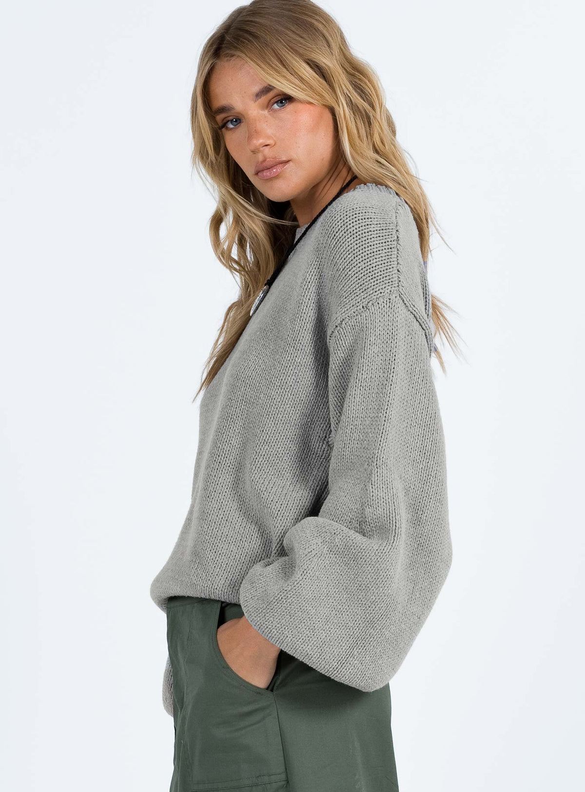 side view of model wearing Princess Polly Harmony Balloon Sleeve Knit Sweater Grey Long 