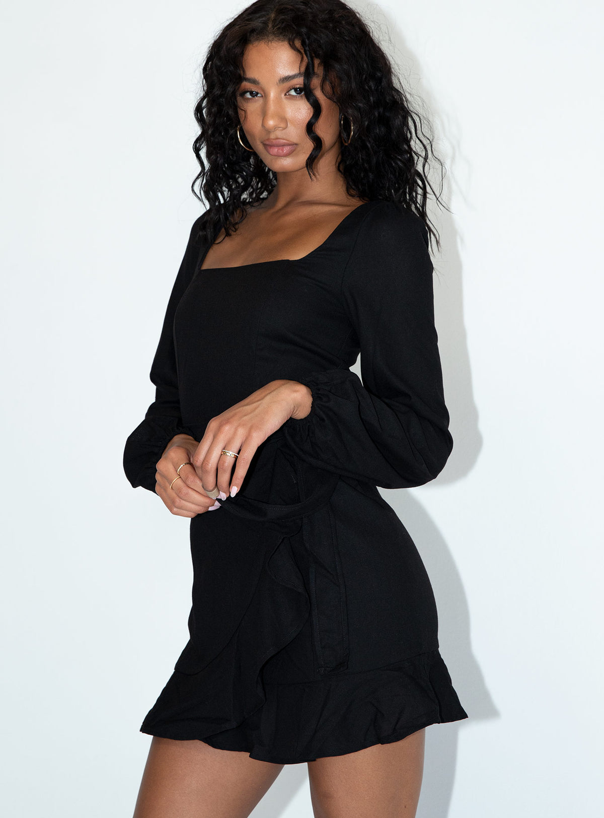 back view of model wearing Princess Polly The Villa Mini Dress Black 