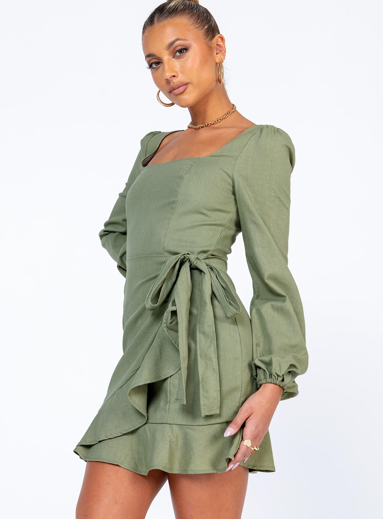 side view of model wearing Princess Polly The Villa Mini Dress Green 
