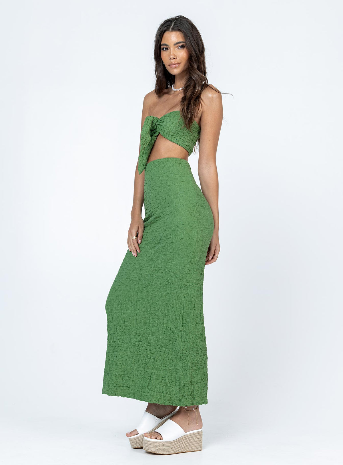 Matching set Crinkle material  Crop top  Can be tied multiple ways  High waisted maxi skirt  Invisible zip fastening at back  High back slit 
