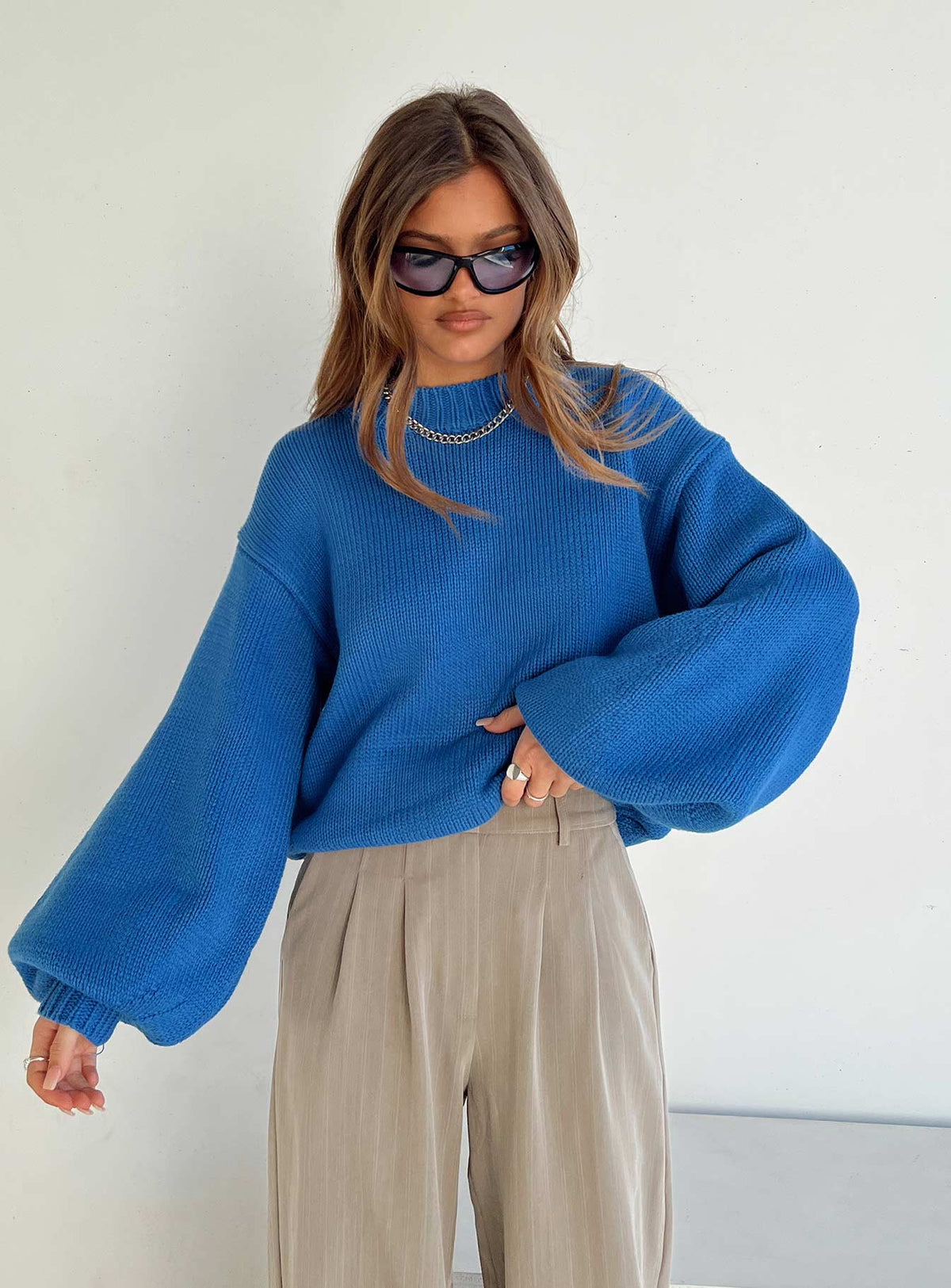 Featuring the Harmony Balloon Sleeve Knit Sweater Blue womens jumpers in short length front view of model wearing Princess Polly