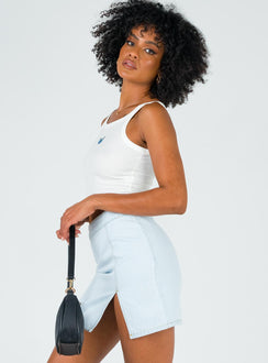   side view of model wearing Princess Polly The Lola Mini Skirt Light Wash Denim Skirts 