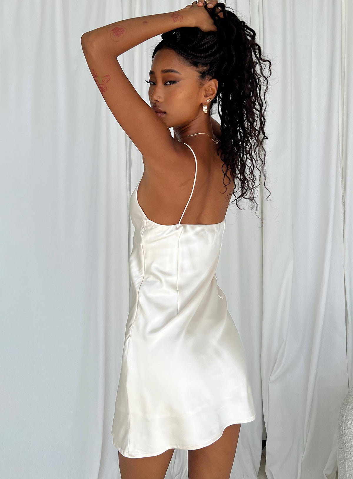 Front view of model wearing  front Princess Polly Square Neck  Marilyn Mini Dress Champagne