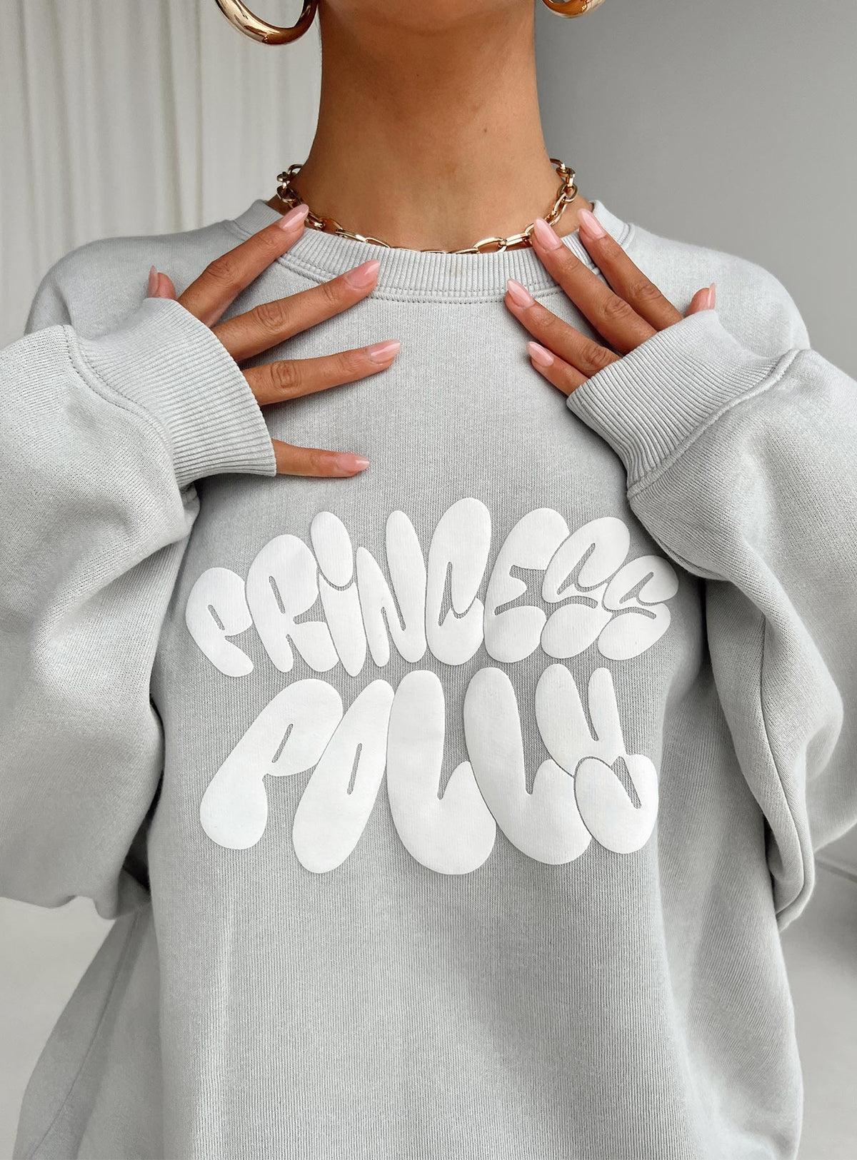 back view of model wearing Princess Polly Princess Polly Crew Neck Sweatshirt Bubble Text Grey / Cloud White Long 