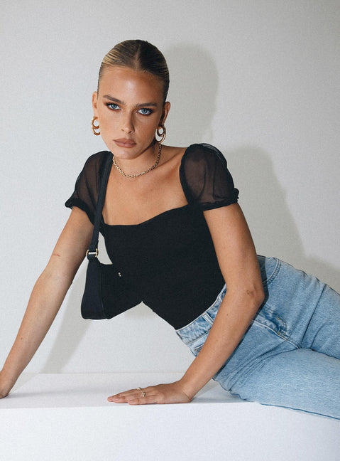 front view of model wearing Princess Polly Dostan Bodysuit Black Short Sleeve Bodysuit 