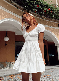 side view of model wearing Princess Polly Daniela Mini Dress White 